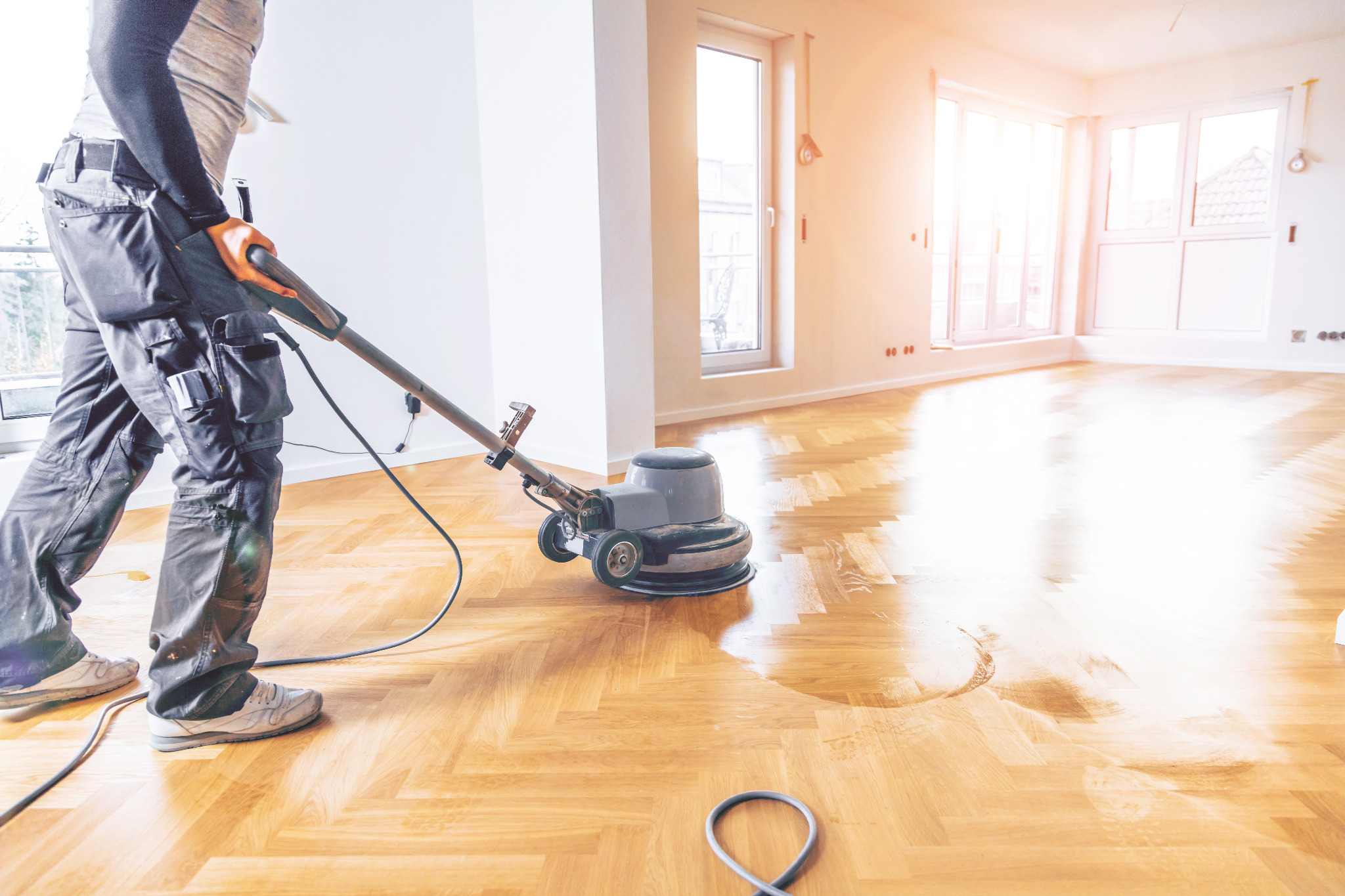 School Floor Buffing in Clapham on an oak herringbone parquet floor, using a rotary buffer to renew a safe, even, low-sheen finish.