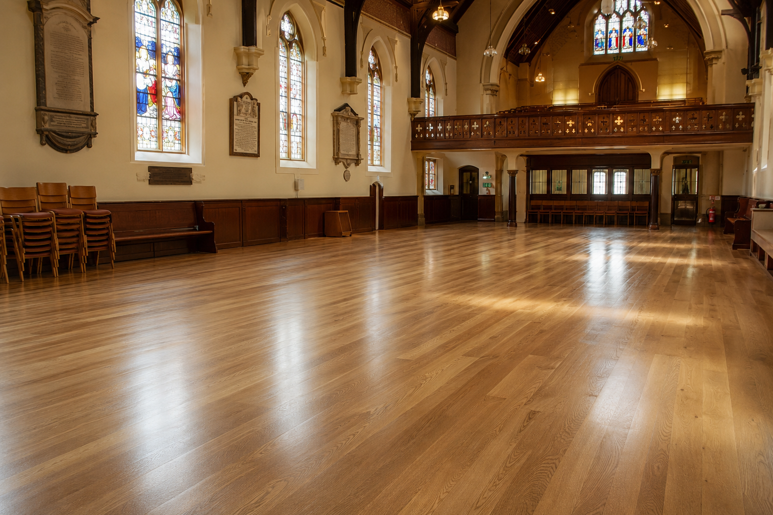 Restored oak wooden floor in a church hall after professional dust-free sanding and refinishing in Clapham