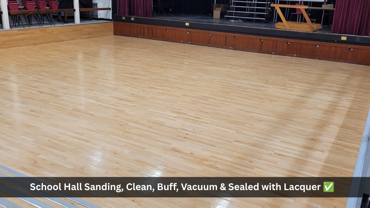Freshly sanded and lacquered school hall wooden floor after professional dust-free restoration in Clapham